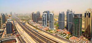 What taxes and fees do you have to pay when purchasing real property in Dubai?